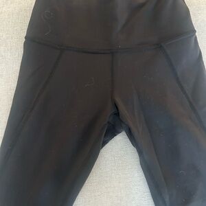 Lululemon Wunder Train Black High-Rise tights. 25in Slit hem. Size 6